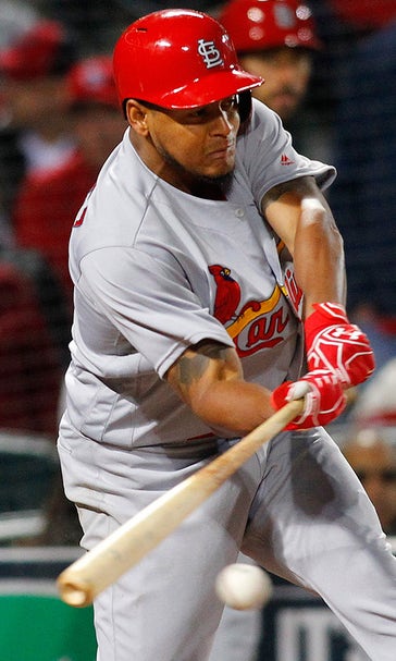 Martinez beats Braves 12-2 with both arm and bat
